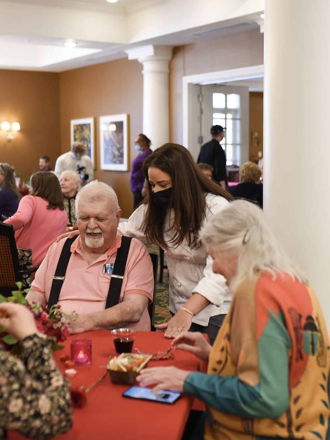 couple being served in a dining hall